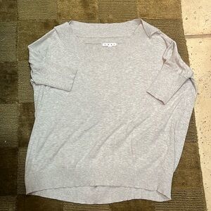 Grey Cabi Scoop neck sweater top with fitted sleeve.